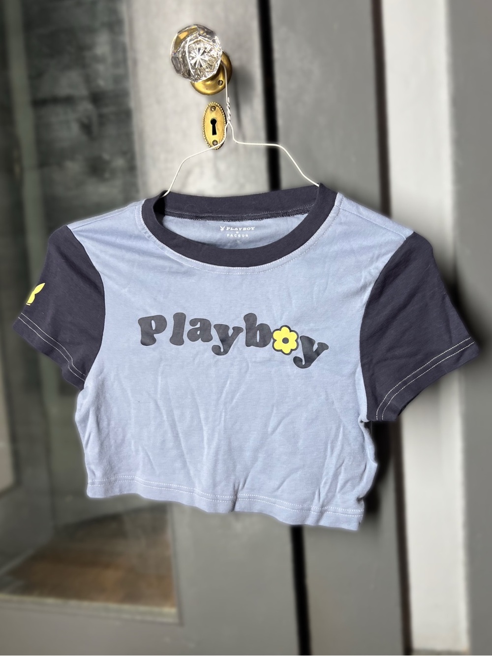 PLAYBOY Light Blue Crop Tee with Navy Sleeves and Yellow Accent